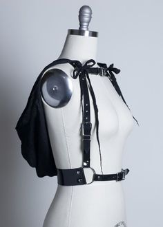 Mysterious, witchy harness belt made in thick, strong PVC or leather.  Channel your inner ghost or wraith and hide beneath a detachable hood in lightweight, soft gauze.  Hood attaches at the shoulders with long gauze fringe ties.  Tie them in bows or leave them loose (shown in pictures both ways).  Fit is adjustable with buckles and straps at waist, shoulders, and across chest.Silver-toned nickel plated steel hardware.   Shown in black PVC with black gauze cape and hood.  Also available in full Trap Clothes, Diy Crop Top, Harness Belt, Black Hood, Cyberpunk Fashion, Black Pvc, Fantasy Clothing, Post Apocalyptic, Detachable Hood