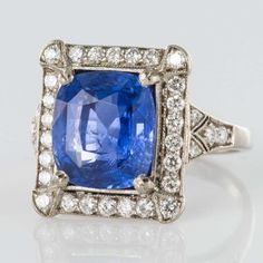 For Sale on 1stDibs - 18K white gold ring, eagle's head hallmark. This splendid rectangular shaped sapphire and white gold ring boasts a cushion cut Ceylan Blue sapphire held Vintage Cocktail Rings, Vintage Cocktail Ring, Ceylon Sapphire, White Gold Ring, Art Deco Jewelry, Sapphire Diamond, Cushion Cut, Brilliant Cut Diamond, Cocktail Rings