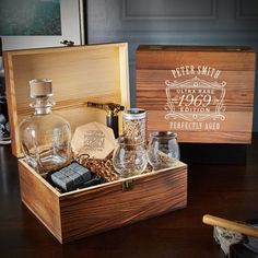 a wooden box filled with liquor bottles and other items