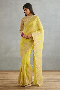 Yellow full sleeve blouse with dori, sequin embroidery in floral pattern.
Components: 1
Pattern: Embroidery
Type Of Work: Sequin, dori
Neckline: Round neck
Sleeve Type: Full sleeves
Fabric: Raw Silk, Cotton Silk
Color: Yellow
Other Details: 
Sheer panelled blouse
Back keyhole
Note: Saree worn by the model is not for sale
Occasion: Wedding - Aza Fashions Festive Saree With Intricate Embroidery And Long Sleeves, Organza Blouse For Celebrations, Long Sleeve Georgette Blouse With Sequins, Long Sleeve Organza Traditional Wear With Intricate Embroidery, Long Sleeve Tissue Silk Traditional Wear For Party, Long Sleeve Organza Traditional Wear For Reception, Long Sleeve Georgette Blouse Piece With Intricate Embroidery, Long Sleeve Chikankari Embroidery Saree For Festivals, Long Sleeve Blouse Piece With Intricate Embroidery