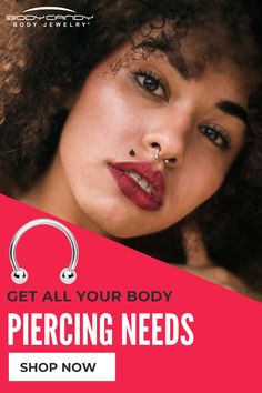 a woman with curly hair and piercings on her nose is featured in the ad for body jewelry