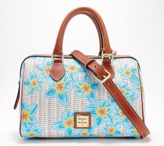 Covered in a fresh, floral design, this coated cotton satchel feels just right for spring. Carry it by the top handles or wear it crossbody with the adjustable strap for hands-free convenience. From Dooney & Bourke. Spring Satchel With Detachable Strap For Daily Use, Daily Use Satchel With Detachable Strap For Spring, Spring Satchel With Adjustable Strap And Double Handle, Spring Satchel With Double Handle And Adjustable Strap, Spring Travel Crossbody Satchel, Spring Travel Satchel With Adjustable Strap, Blue Satchel With Detachable Handle For Spring, Spring Satchel With Adjustable Handle For On-the-go, Spring Travel Satchel With Top Carry Handle