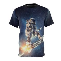 "AOP tee -- \"Surfing with the aliens\" -- Astronaut tee * Uniquely textured, microfiber knit fabric wicks perspiration away from the skin, drawing it to the surface where it evaporates. * 100% Polyester * Light fabric (4.0 oz/yd² (113 g/m / (6.0 oz/yd² (170 g/m * Regular fit * Tagless * Runs true to size Image by [Sergey Nivens / Shutterstock]" Lotr Shirt, Skin Drawing, Alien Shirt, The Aliens, All Over Print Shirt, Space Flight, Clothing Care, Outer Space, Print Shirt