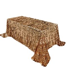 a table covered in gold sequins