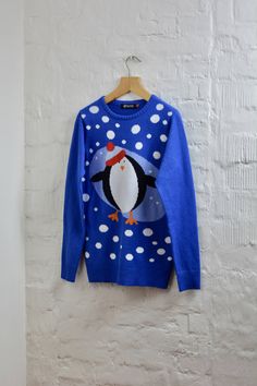 Vintage Blue Knitted Ugly Christmas Sweater Christmas Bird Light Blue Winter Cardigan Stockings Blue Cosby Jumper Size M Knitted Festival Jumper.  Material: 100% Acrylic Measurements: Pit to pit: 19,2"/49cm. Shoulder: 15,7"/40cm. Length: 27,5"/70cm. Sleeve: 25,5"/65cm. Condition: Great Vintage Condition.  Please feel free to ask any questions about the items for more details before purchase.   Please note - ships from North Europe, and delivery to US, Canada, Australia takes average 2-3 weeks Ke Light Blue Crew Neck Winter Sweater, Light Blue Crew Neck Sweater For Winter, Blue Crew Neck Cardigan For Winter, Blue Knitted Winter Cardigan, Blue Fair Isle Pattern Winter Sweater, Light Blue Crew Neck Cardigan For Winter, Blue Christmas Holiday Sweater, Bird Light, North Europe