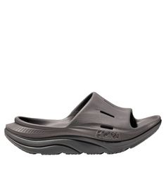 These lightweight slides feature exceptional cushioned comfort, perfect to slip on after long days on the trail or for lounging around the house. Half sizes order down. Order your regular Hoka size. Air flow channels help keep feet dry and cool. Sugarcane EVA upper and footbed provide all-day comfort. Injection-molded EVA midsole and outsole cushions while providing traction and durability. Imported. | Adults' Hoka Ora Recovery Slides 3 Men's Sandals, Water Shoes, Injection Moulding, The Trail, Mens Sandals, L L Bean, The House, Slides, Slip On