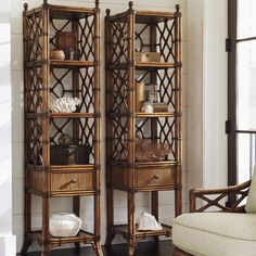 two wooden shelves with baskets on them in a living room