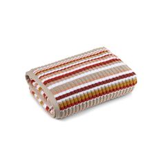 a multicolored striped towel on a white background