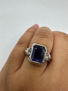 Vintage wedding band  Unusual deep toned Iolite surrounded by diamonds  14 k white gold setting handmade  Size 8 Can be resized our jeweler charges $20  All rings are shipped in a nice gift box.   Check out our over a THOUSAND great reviews Engraving is $4 per letter and is not always perfect depending on the piece. It can take a few days if the jeweler is busy. This is payable to Paypal Judithsltd@gmail.com Emerald Cut Platinum Gemstones In White Gold, Formal Tanzanite Diamond Ring With Center Stone, Vvs Clarity Emerald-cut Sapphire Ring In Platinum, Emerald Cut Vvs Clarity Sapphire Ring In Platinum, Octagon Sapphire Diamond Ring, Formal Tanzanite Diamond Ring With Prong Setting, Formal Tanzanite Rings With Prong Setting, Formal Octagon Sapphire Diamond Ring, Emerald Cut Diamond Gemstones For Formal Events