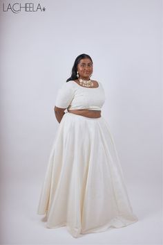 We are Lacheela (@lacheelaclothing). A South Asian clothing brand for plus size people, carrying sizes UK 16 - 28 and US 12 - 22. We give people the power to take control of their own style with our mix and match collection! Plus Size Indian Outfits For Wedding, Skirt And Top Indian, Plus Size Lehenga, Asian Clothing, Plain White T's, Match Collection, Cream Skirt, Indian Wedding Wear, Full Skirts