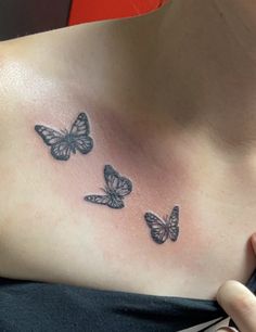 Three butterflies across the collarbone 3 Butterfly Tattoo Small Collarbone, Colar Bone Butterfly Tattoo For Women, Colar Bone Tattoo Butterflies, Butterfly Tattoo On Collar Bone For Women, Butterfly Tattoos On Collar Bone, 3 Butterfly Tattoo Collar Bone, Butterfly Tattoo Under Collar Bone, Butterflies On Collarbone Tattoo, Butterfly Tattoo On Front Shoulder