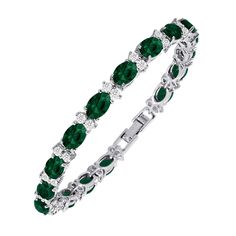 PRICES MAY VARY. AFFORDABLE CUBIC ZIRCONIA TENNIS BRACELET WITH DIAMOND-LIKE BRILLIANCE: With gorgeous White Round CZ, Oval Cut simulated Emerald Gemstones accentuated by Silver Plated Brass, this Tennis Bracelet will add a diamond-like brilliance to any outfits; go on, enjoy the radiance of CZ and simulated gemstones at only a fraction of the price of real diamonds and precious stones. CHARMING GEMSTONE BRACELET FOR ALL OCCASIONS: The perfect present for anniversaries, weddings, graduations, or Cz Jewellery, Aqua Gemstone, Ladies Gifts, Cartier Bracelet, Cubic Zirconia Bracelet, Silver Bracelets For Women, Emerald Bracelet, Best Gifts For Her, Fancy Diamonds