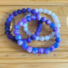 This Is A Gorgeous, Handmade Bracelet Set. This Set Features White Frosted Agate Beads, Purple Frosted Agate Beads, And Purple/Blue Marble Glass Beads In 10mm. This Set Fits A Size 7 Inch Wrist But Can Be Made To Fit From A 5.5 Inch Wrist To A Size 8 Inch Wrist. You Can Request A Charm To Be Added To Your Set. If A Charm Is Requested, It Will Be A Random Pick By Creator But Will Definitely Rock With The Set Chosen! Once You Purchase, Please Message Me Your Wrist Size And Whether A Charm Is Being White Stretch Bracelet With Faceted Beads For Healing, Elegant White Agate Crystal Bracelet, White Casual Beaded Bracelets With Gemstone Beads, Casual White Beaded Bracelet With Gemstone Beads, White Gemstone Beads Casual Bracelet, Casual White Beaded Bracelets With Gemstone, Casual White Gemstone Beaded Bracelets, Adjustable Purple Agate Beaded Bracelets, Adjustable White Agate Bracelets