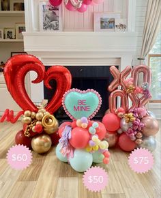 balloons and heliums in the shape of hearts are on display for valentine's day