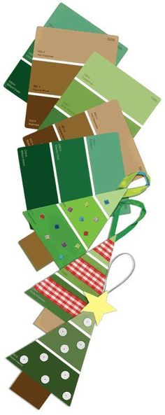 a pile of green and red christmas cards on top of each other, with the same color