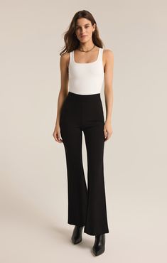 We love a good flare and this pant effortlessly transitions from the office to daily life. This chic high rise pant features a slim fit throughout the hips, a kick flare, and our fave detail; the supportive feel from the durable, stretchy fabric. Z SUPPLY Women's Do It All Flare Pant, Black, Large Lounge Bra, Flare Pant, Kick Flares, High Rise Pants, Stretchy Fabric, Flare Pants, Love A, Daily Life, The Office