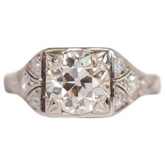 Ring Size: 5.75 Metal Type: Platinum [Hallmarked, and Tested] Weight: 3.3 grams Center Diamond Details: GIA REPORT#2201969218 Weight: 1.50 carat Cut: Old European Brilliant Color: J Clarity: VS2 Side Diamond Details: Weight: .10 carat, total weight Cut: Old European Color: G Clarity: VS Finger to Top of Stone Measurement: 6mm Condition: Excellent Brilliant Engagement Rings, 1920 Art, 1920 Art Deco, Platinum Diamond Engagement Rings, Platinum Engagement Rings, Art Deco Jewelry, Brilliant Diamond, Engagement Rings Sapphire, Jewelry Rings Engagement