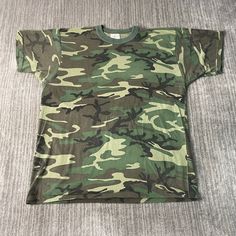 Vintage 2000s Camouflage Pattern Basic Blank Essential Streetwear Y2K Aesthetic Green T Shirt Extra Large Mens Condition:  Excellent Used Condition  = No Flaws Measurements: Please see photos above for all measurements IF YOU BUY TWO OR MORE ITEMS USE THE CODE BUNDLE @ CHECK TO SAVE 20% WE SHIP WITHIN 24 HOURS AFTER PURCHASE! Please be aware that we do not offer free returns!! The Buyer is responsible for the cost of the return label.  Follow us on TikTok & Instagram @findsnostalgic and tag us i Military Style Crew Neck T-shirt For Streetwear, Green Military Style T-shirt With Crew Neck, Green Military Crew Neck T-shirt, Military Crew Neck T-shirt For Streetwear, Green Military Style Crew Neck T-shirt, Military Cotton Tops For Streetwear, Military Crew Neck T-shirt, Military Style Cotton Tops For Streetwear, Outdoor Camouflage Cotton T-shirt