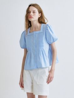 This is a trendy and feminine blouse by ANEDIT that is made out of high quality and sturdy material. With distinctive mood of the design and modern feminine look, you can style it for your comfortable daily outfit.- Feminine mood and soft touch- Square neckline with lace tape- A line silhouette with lovely mood- Subtle puffy sleeves Spring Cotton Blouse With Square Neck, Cotton Square Neck Blouse For Day Out, Chic Cotton Tops With Puff Sleeves, Chic Cotton Top With Puff Sleeves, Chic Cotton Tops With Square Neck, Chic Cotton Puff Sleeve Top For Day Out, Spring Cotton Puff Sleeve Top For Workwear, Chic Cotton Puff Sleeve Top For Daywear, Casual Cotton Square Neck Blouse