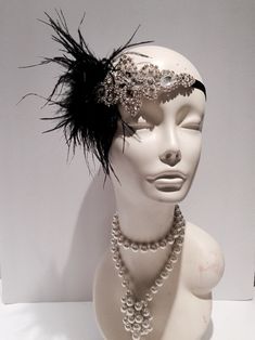 Black & Silver Feather Headpiece- Gatsby Wedding- Feather 20's Head Wrap- 1920 Hair Accessory- Speakeasy- Handmade in USA- Charleston Hair Accessory- Gatsby Style. Hello, This black feather fascinator head wrap is made with ostrich feathers. The rhinestone piece measures about 4 inches long by 2 inches and the feathers are 6-8inches. They are placed on a stretch band that fits any adult head size and very comfortable. Other Feather Colors available in: white ivory pink orange fuschia red cor Charleston Hair, 1920 Accessories, Gatsby Decor, 1920 Hair, 1920s Hair Accessories, Junk Kouture, Peaky Blinders Hat, Cat Story, Gatsby Headpiece