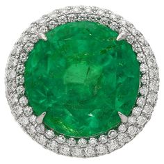 an oval emerald and diamond ring