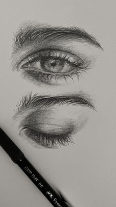 a pencil drawing of an eye