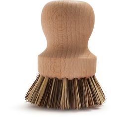 a small wooden brush with long bristles on the top and bottom of it's head