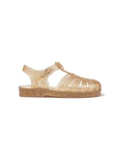 gold-tone glitter detailing transparent design caged design round toe buckle-fastening ankle strap branded insole flat sole Flat Jelly Sandals For Party, Jelly Round Toe Sandals For Party, Clear Flat Jelly Sandals, Flat Clear Jelly Sandals, Gold Jelly Sandals With Round Toe For Spring, Glitter Round Toe Jelly Sandals For Party, Glitter Jelly Sandals With Round Toe For Summer, Glitter Jelly Sandals For Summer, Summer Glitter Jelly Sandals With Round Toe