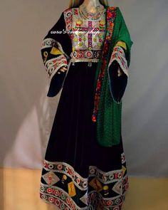 afghan kuchi traditional wedding drees is made of good quality long lasting fabric. Traditionally such Afghanistan Persian Pashtun new design frocks are used as bridal dress. Most of girls also like and recommend such dresses for wedding, Nikkah and Mehndi night events. The dress measurements are kept average. If you need this frock in exact measurements you need, then please send us measurements which best fit on your body Bohemian Embroidered Ceremonial Gown, Ceremonial Bohemian Traditional Wear With Dabka Detailing, Bohemian Style Ceremonial Dupatta With Dabka, Bohemian Long Gown With Dabka Embroidery, Bohemian Long Gown With Dabka, Bohemian Long Gown With Dabka Details, Long Traditional Wear With Mirror Work, Traditional Long Wear With Mirror Work, Traditional Long Lehenga With Mirror Work