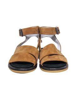 Enjoy life's sunniest days in these Rag & Bone tan suede sandals! The ankle buckle detail makes these the perfect Summer staple that will keep you Coachella-ready. Get your festival on! Size 8.5 Leather upper and lining Side ankle buckle detail Toe to heel 10.25" Brown Slingback Sandals With Buckle Closure For Summer, Trendy Brown Footbed Sandals For Summer, Brown Ankle Strap Footbed Sandals For Summer, Spring Brown Ankle Strap Footbed Sandals, Summer Brown Ankle Strap Footbed Sandals, Summer Brown Footbed Sandals With Ankle Strap, Adjustable Buckle Closure Sandals For Day Out, Suede Footbed Sandals With Suede Lining For Summer, Brown Suede Ankle Strap Sandals