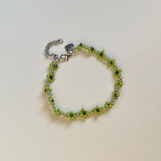 "✿ Made with glass seed beads and metal accents ✿ Lime green, silver, and black ✿ 7.75\" plus 1.5\" of extension chain" Trendy Green Metal Jewelry, Green Beaded Bracelet For Gift, Green Beaded Chain Bracelets As A Gift, Green Beaded Chain Bracelet As Gift, Adjustable Green Beads With Silver Accents, Green Beaded Chain Bracelet For Gift, Green Beaded Chain Bracelets For Jewelry Making, Green Beaded Chain Bracelet For Jewelry Making, Green Metal Beaded Bracelets For Jewelry Making