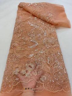 This high quality Fabric is measured in 5 Yards With Embroidered Beading and Sequin. It is soft, very delicate and beautiful. This high Quality Fabric is made with Fashion embroidered rhinestones can be used in making party wedding dresses, skirts, shawls, scarves and other other fashion apparels as you would like. Size : Length : 5 yards (180 inch). Width: 50 inch (Please allow slight deviation for the measurement data ,±1 inch) Material: 100% Polyester, Tulle Lace Fabric, Eco-Friendly embroide Elegant Pink Sequin Fabric For Banquet, Pink Beaded Embroidered Fabric For Party, Orange Embroidered Wedding Fabric, Pink Embroidered Fabric With Rhinestones For Wedding, Elegant Pink Sequin Fabric For Weddings, Elegant Rhinestone Embroidered Fabric For Banquet, Pink Lace Fabric With Rhinestones Embroidery, Elegant Pink Embroidered Sequin Fabric, Pink Rhinestone-embroidered Lace Fabric