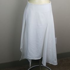 Brand New With Tags. Has A Few Pulled Threads. Smoke-Free Home. Measurements: Waist: 14" Length: 33.5" Spring Wrap Skirt With Asymmetrical Hem, Asymmetrical Flowy Skirt In Solid Color, Flowy Asymmetrical Solid Skirt, Chic White High-low Hem Bottoms, Solid Color Maxi Skirt With Asymmetrical Hem For Summer, Spring Stretch Maxi Skirt With Asymmetrical Design, Spring Maxi Skirt With Asymmetrical Hem, White Flowy Skirt With Handkerchief Hem, Solid Color Asymmetrical Hem Maxi Skirt For Summer