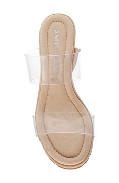 An espadrille-style wedge and transparent straps distinguish a versatile sandal perfect for warm-weather outings, parties and getaways. 3" heel Synthetic upper and lining/rubber sole Imported Synthetic Sandals With Transparent Straps And Block Heel, Sandals With Transparent Straps And Block Heel, Clear High Heel Wedge Sandals For Spring, Summer Sandals With Ankle Strap And Transparent Straps, Spring High Heel Clear Wedge Sandals, Spring Clear High Heel Wedge Sandals, Clear Block Heel Sandals With Wrapped Heel, Clear Sandals With Wrapped Block Heel, Summer Clear Heels With Transparent Straps