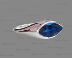 Blue Sapphire Ring, Minimalist Ring, 925 Silver, Statement Ring, Anniversary Gift, Marquise Cut Sapphire Quartz Ring, September Birthstone Gemstone- Blue Sapphire Quartz Stone Shape - Marquise Stone Cut - Faceted Stone Color- Blue Stone Size - 10X5 mm ( Approx) Stone Quality - Glass Filled Note - Please Note that the stone used in this picture can vary in textures cause genuine gemstones may vary in texture. and the color may be slightly differ from the picture shown cause photographic effects. Formal Blue Sterling Silver Stackable Rings, Saphir Ring, Blue Sapphire Ring, Ring Minimalist, Minimalist Ring, September Birthstone, Blue Sapphire Rings, Quartz Ring, Minimalist Rings