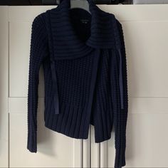 Euc, Some Very Minor Pilling On Sleeves As Shown In Detail. Overall, Not Very Noticeable Imo Due To Bumpy Nature Of Open Knit Design And Dark Navy Color. Unique And Rare Shape Of Sweater Makes Up For It. One Button, Asymmetrical Closure. Theory Navy Fisherman Cable Knit Shawl Collar Cardigan (S/Xs), Asymmetrical Cardigan On Trend For Fall / Winter 2024 - 2025 Fisherman Sweater Cardigan, Blue V-neck Knitted Outerwear, Blue Wool Single-breasted Outerwear, Asymmetrical Cardigan, Blue Textured Knit Long-sleeve Cardigan, Shawl Collar Cardigan, Fisherman Sweater, Sweater Making, Shawl Collar