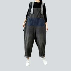 Introducing the 2023 Spring-Summer Collection's dark grey women's denim jumpsuit ââ‚?the perfect blend of contemporary fashion and nostalgic grunge! Crafted with premium quality denim. this fashion-forward piece features an edgy. distressed pattern with a sleek slim fit. Plus. a resilient zipper and stylish button closure ensure both function and style.Distinctive Features: Patchwork Design: An expertly crafted distressed pattern to capture a raw. unfiltered essence. Baggy Fit: Textured to hug y Womens Denim Jumpsuit, Jeans Street Style, Jumpsuit Online, Street Style Trends, Modern Trend, Grey Denim, Denim Design, Patchwork Designs, Street Style Looks