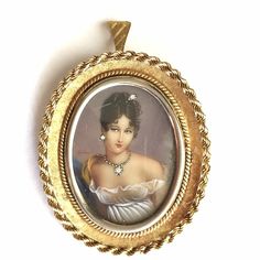 "Framed 18 Karat gold Portrait  of a Lady in Jewels   Size: 1 7/8 inch by 1 1/2 inch  Weight: 15.5 gram Frame Material: Tested and marked '18K'  Country of origin: Unknown Hallmarks: Signed 'HIL' on the painting  Condition: No apparent damage, see pictures  No damage, no loss to painting, signed \"HIL\", painted colorful female portrait of a woman in white dress wearing jewelry, three small diamond accent stones embedded in portrait, 46.5mm x 38.0mm in size see pictures" Lady In White Dress, Gold Portrait, Woman In White Dress, Lady In White, Woman In White, Wearing Jewelry, Portrait Of A Woman, Female Portrait, Wearing Dress