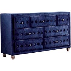 a blue dresser with many drawers and knobs on the front, sitting against a white background