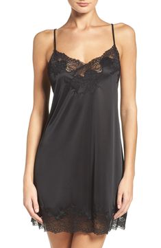 Bring an alluring style refresh to your sleepwear collection with this silky satin chemise veiled with pretty floral lace. 25 1/2" center front length (size Medium) V-neck Adjustable straps Unlined 100% polyester with 90% nylon, 10% elastane trim Machine wash, line dry Imported Satin V-neck Coquette Sleepwear, Fitted Satin Finish V-neck Sleepwear, Sheer V-neck Slip Dress For Sleep, V-neck Satin Chemise For Wedding Night, Coquette Satin V-neck Sleepwear, Coquette V-neck Sleep Chemise, Coquette Slip Dress For Night, Fitted Satin V-neck Chemise, Elegant Cami Chemise For Sleep