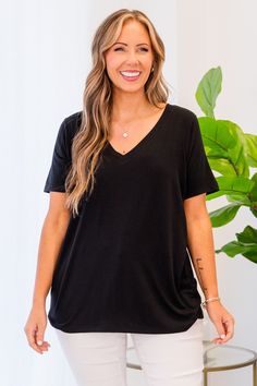 Elevate your wardrobe with our new Take The Day Off Top in black! This v-neckline basic is sure to become your favorite, offering endless styling options that make it a versatile essential for any occasion! Stay comfortable and chic all day long! 57% Polyester, 38% Rayon, 5% Spandex Spring Everyday V-neck Top, Black V-neck Top Versatile Style, Chic Black Long Sleeve V-neck Top, Everyday V-neck Top In Specific Color, Chic Black V-neck Top With Short Sleeves, Black V-neck Top For Spring, Short Dresses Party, Jumpsuit Shorts Rompers, Summer Chic