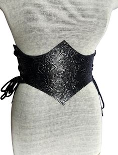 "It is Handmade leather corset with embossed beautiful designs. Handmade and hand dyed belt with high quality leather. It is adjustable with lace.  MEASUREMENTS: S/M : 66 cm - 74 cm / 26\" in - 29\"in M / L: 75 cm-85 cm / 29.5 \"in - 33.5\" in L / XL: 85 cm-95  cm / 33.5 \"in - 37.4\" in XXL: 95 cm-105 cm / 37.4 \"in - 41.3\" in DETAILS: ► 100% handmade ► 100% genuine leather ► Made on your measurements ► Unique design ► Battle ready ► LARP standard ► Worldwide delivery NOTE: This item can be personalized on request (contact us). Please update me your contact number and email address when you order, becuase I have to provide these contact details to courier when I send the parcel. We remind our customers that you can find the MEASURES of the items in the description. It is your responsibil Under Bust Corset, Gothic Medieval, Leather Corset Belt, Black Neck, Corset Belt, Leather Corset, Suspender Belt, Leather Collar, Larp