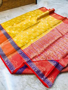 Beautiful Pure Kanchi Silk Weaving Work Saree With Unstitched Blouse For Women Wedding /Party Wear Indian saree FABRIC : SOFT KANCHISILK CLOTH DESIGN : BEAUTIFUL RICH PALLU AND JACQUARD WORK ON ALL OVER THE SAREE. BLOUSE : EXCLUSIVE BEAUTIFUL JACQUARD BORDER BLOUSE. (UNSTITCHED) Saree: Fabric. :- Soft Kanchi silk Work :- weaving Cute :- 5.5 mtr Blouse: Fabric. :- Soft Kanchi silk Work :- weaving Cute. :- 0.80 mtr Wash Instruction:- Dry Clean Only Occasion: Wedding Wear, Party Wear, Festive Wear, Yellow Katan Silk Traditional Wear For Wedding, Yellow Lehenga With Zari Weaving For Wedding, Elegant Yellow Traditional Wear For Ceremonies, Yellow Traditional Wear With Self Design For Ceremonies, Yellow Traditional Wear With Self Design For Wedding, Traditional Pattern Fitted Saree For Wedding, Yellow Self Design Traditional Wear For Wedding, Yellow Self-design Traditional Wear For Wedding, Fitted Saree With Traditional Patterns For Wedding