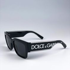 D&G Dg6184 501/87 Sunglasses Black Dark Grey Square Unisex Brand: Dolce & Gabbana Model: Dg6184 Color Code: 501/87 Gender: Men / Unisex Year: 2023 Frame Colour: Crystal / Black Frame Shape: Square Frame Style: Full Rim Frame Material: Molded Plastic Lens Color: Dark Grey Lens Material: Polycarbonate Size: 52x18x145 100% Uv Protection. Made In Italy. Full Retail Package With All Accessories: Case, Cloth And All Paperwork. 100% Authentic! Luxury Black Glass Sunglasses, Designer Black Sunglasses With Glass Lenses, Classic Black Glass Sunglasses, Designer Black Square Frame Sunglasses, Designer Black Sunglasses For Summer, Designer Black Sunglasses With Uva Protection, Pretty Sunglasses, Dolce And Gabbana Runway, Womens Prescription Glasses