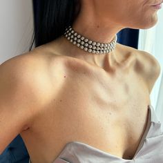 Fall in love with this three layers silver pearls choker necklace. Good to wear with your everyday outfits or to give a bit of sophistication to your evening dress.  This choker necklace would be perfect for your bridesmaids to match their dresses and create a seamless look! I actually have a discount code if you buy more than 3 necklaces for your bridesmaids or flower girls. Add this code at the checkout and you will get 25% OFF: BRIDESMAIDS (this code is valid when you're buying 3 or more neck Formal Pearl Embellished Choker, Silver Multi-strand Party Choker, Adjustable Silver Pearl Drop Choker, Formal Costume Multi-strand Pearl Necklace, Formal Pearl-embellished Choker Necklace, Three Strand Pearl Necklace, Pearls Choker, Layered Chokers, Pearl Choker Necklace