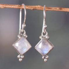 The ethereal light emanating from these diamond-shaped rainbow moonstones calls for harmony and serenity, blessing your days and ensembles. Present in Narayannii's sterling silver dangle earrings directly from India, the natural cabochons are enriched by a polished finish, making the design the perfect accent for casual or formal occasions. Silver Moonstone Birthstone Earrings, Silver Moonstone Earrings With Birthstone, Silver Birthstone Earrings With Moonstone, Spiritual Silver Moonstone Earrings, Bohemian Hypoallergenic Moonstone Jewelry, Spiritual Moonstone Jewelry With Matching Earrings, Ethereal Earrings, Ethereal Light, Droplet Earrings