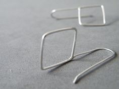 "I'd never guessed I could love geometry so much! My geometric collection is enriched by these sterling silver square earrings, lovingly handmade using silver wire. Minimalist and comfortable, are a great piece of jewelry to add style and edge to your look. Original gift idea for someone special! Measures/Details - earrings height 1.4 inches (3.5 cm) - square measures 0.6 by 0.6 inches (1.5 x 1.5 cm) All my pieces are carefully handmade. Irregularities and imperfection are signs of authenticity. Minimalist Nickel-free Square Pendant Jewelry, Everyday Sterling Silver Rectangular Jewelry, Minimalist Square Hypoallergenic Jewelry, Minimalist Hypoallergenic Square Jewelry, Minimalist Silver Rectangular Earrings, Minimalist Square Hypoallergenic Earrings, Hypoallergenic Square Sterling Silver Jewelry, Handmade Square Minimalist Jewelry, Minimalist Hypoallergenic Square Earrings