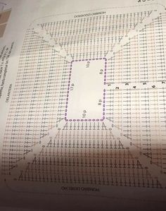 a piece of paper that is laying on top of a sheet of paper with numbers and lines in it