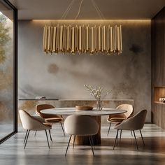 a modern dining room table with chairs and a chandelier hanging from the ceiling