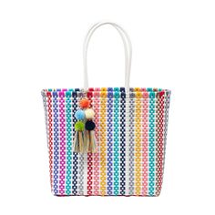 Hand woven with the spirit of true Mexican craftsmanship, this Medium Tote is the epitome of functionality and fun. Whether for the beach, boat, traveling or market, it will fit all your items and guarantee to travel with style and ease. With a lightweight feel and abundant interior the Tote is a chic yet practical bag. Color: Multicolor/White Collapsible for travel Easily washed interior and exterior Reinforced handle for weight and durability Handcrafted from thick woven recycled plastic Size: Beach Boat, Photography London, Practical Bag, Oversized Tote, White Tote, Open Weave, Medium Tote, Beach Accessories, The Spirit